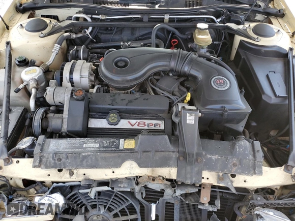 1992 Cadillac Seville z VIN 1G6KS53B0NU837105, wystawiony jako Copart lot #55865205 z przebiegiem 94 740 mil mil oraz Szkody całkowita. Historia ofert i sprzedaży dostępna na DreamBid. Obrazek 11.