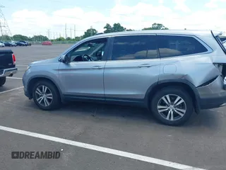 2018 Honda Pilot EX-L with VIN 5FNYF5H56JB003955, listed as a IAAI auction lot 42732433 with 116,613 mi miles and . Bid and sale history available at DreamBid. Image 14.