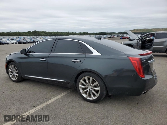 2016 Cadillac XTS Luxury Collection with VIN 2G61N5S34G9120168, listed as a Copart auction lot 61776225 with 83,721 mi miles and Salvage title. Bid and sale history available at DreamBid. Image 2.
