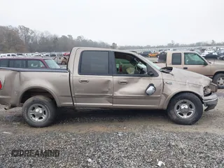 2003 Ford F-150 XLT with VIN 1FTRW07L53KB16888, listed as a IAAI auction lot 41474315 with 72,465 mi miles. Bid and sale history available at carsss.com. Image 14.