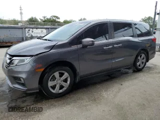 2019 Honda Odyssey EX-L with VIN 5FNRL6H75KB004911, listed as a Copart auction lot 48954335 with 74,720 mi miles and Clean Title. Bid and sale history available at carsss.com. Image 1.