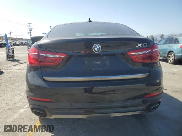 2018 BMW X6 sDrive35i z VIN 5UXKU0C54J0G69704, wystawiony jako Copart lot #57335475 z przebiegiem 61 777 mil mil oraz Szkoda całkowita • Salvage title. Historia ofert i sprzedaży dostępna na DreamBid. Obrazek 6.