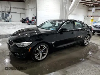 2015 BMW 4 Series 428i xDrive with VIN WBA4C9C5XFD330554, listed as a Copart auction lot 61933905 with 122,452 mi miles and Salvage title. Bid and sale history available at DreamBid. Image 1.