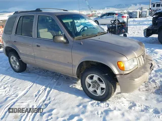 2002 Kia Sportage with VIN KNDJA723025169426, listed as a IAAI auction lot 41372132 with 177,894 mi miles. Bid and sale history available at carsss.com. Image 1.