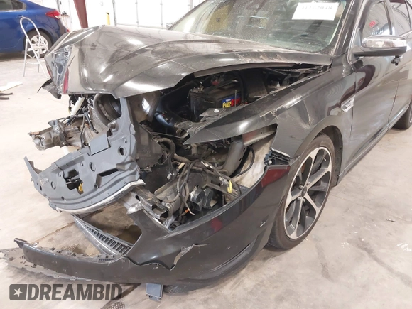 2014 Ford Taurus Limited с VIN 1FAHP2J84EG112559, выставлен на аукционе IAAI как лот 41162048 с пробегом 184 301 миль миль и . История ставок и продаж доступна на DreamBid. Изображение 16.
