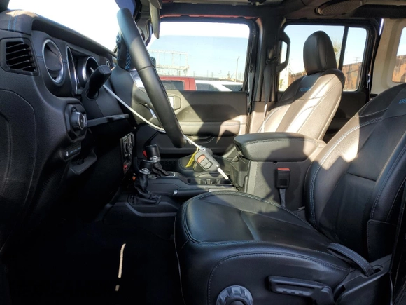 2022 Jeep Wrangler Unlimited Rubicon with VIN 1C4JJXR64NW198894, listed as a Copart auction lot 49899255 with 25,120 mi miles and Salvage title. Bid and sale history available at DreamBid. Image 7.