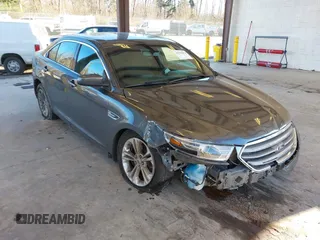 2018 Ford Taurus SEL with VIN 1FAHP2H82JG112785, listed as a IAAI auction lot 41376074 with 98,754 mi miles. Bid and sale history available at carsss.com. Image 1.