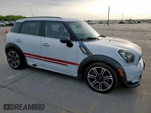 2014 MINI Countryman S with VIN WMWZC3C53EWT01161, listed as a Copart auction lot 50586965 with 151,813 mi miles and Salvage Title. Bid and sale history available at DreamBid. Image 4.
