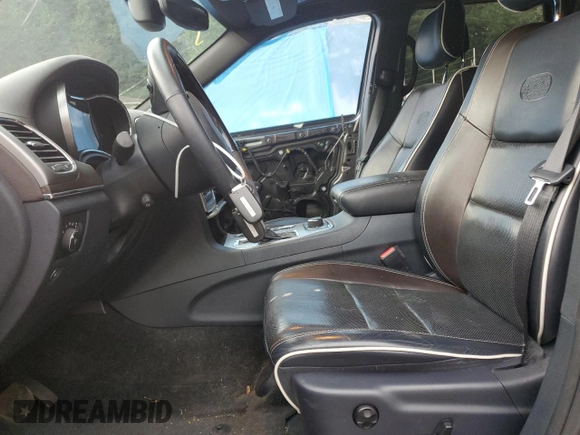 2017 Jeep Grand Cherokee Overland with VIN 1C4RJFCG4HC730861, listed as a Copart auction lot 62918825 with 77,228 mi miles and Salvage title. Bid and sale history available at DreamBid. Image 7.