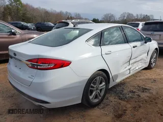 2018 Ford Fusion SE with VIN 3FA6P0HD7JR229022, listed as a IAAI auction lot 41758924 with 121,598 mi miles. Bid and sale history available at carsss.com. Image 4.