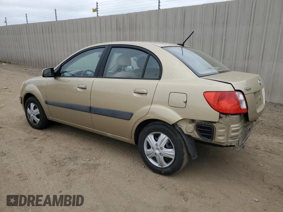 2009 Kia Rio LX with VIN KNADE223496549097, listed as a Copart auction lot 54375975 with 140,882 mi miles and Salvage Title. Bid and sale history available at DreamBid. Image 2.
