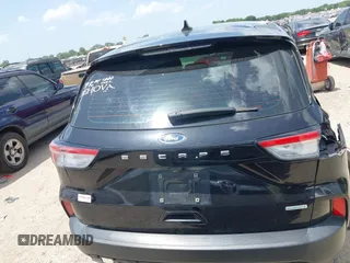 2020 Ford Escape S with VIN 1FMCU0F65LUB66679, listed as a IAAI auction lot 42531877 with 58,071 mi miles and . Bid and sale history available at DreamBid. Image 16.
