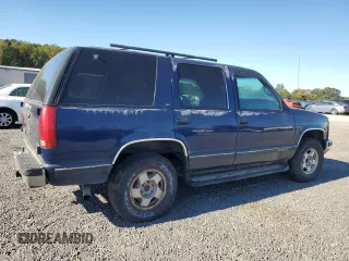 1999 GMC Yukon with VIN 1GKEK13R3XJ757466, listed as a Copart auction lot 75750884 with 270,768 mi miles and Salvage Title. Bid and sale history available at carsss.com. Image 3.