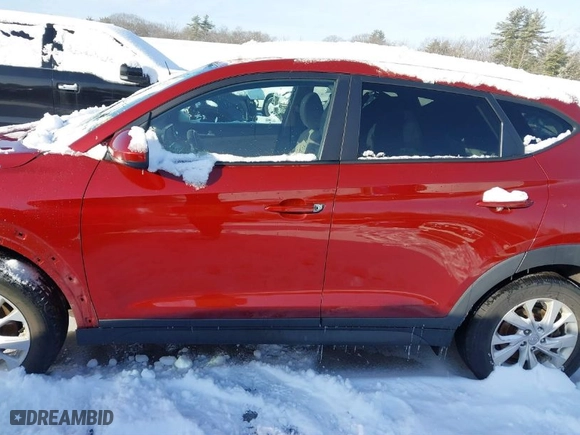 2019 Hyundai Tucson SE with VIN KM8J2CA44KU981393, listed as a IAAI auction lot 41455334 with 98,318 mi miles. Bid and sale history available at carsss.com. Image 15.