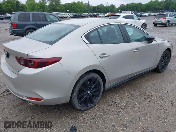 2024 Mazda 3 S Select Sport with VIN 3MZBPABM0RM403431, listed as a IAAI auction lot 42366921 with Not provided miles and . Bid and sale history available at DreamBid. Image 4.