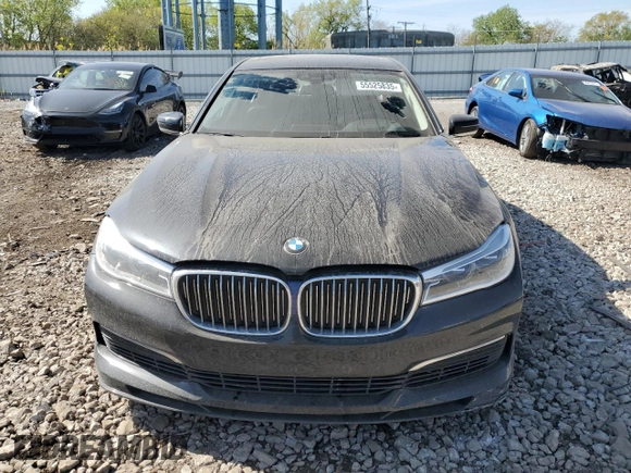 2019 BMW 7 Series with VIN WBA7F2C13KB242430, listed as a Copart auction lot 55525835 with 58,559 mi miles and Salvage title. Bid and sale history available at DreamBid. Image 5.
