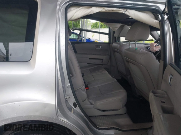 2013 Honda Pilot EX-L with VIN 5FNYF4H52DB056747, listed as a IAAI auction lot 42373409 with Not provided miles and . Bid and sale history available at DreamBid. Image 8.