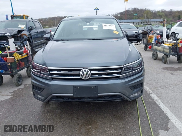 2019 Volkswagen Tiguan SEL Premium with VIN 3VV4B7AX9KM095580, listed as a IAAI auction lot 41915639 with 67,440 mi miles and . Bid and sale history available at DreamBid. Image 12.