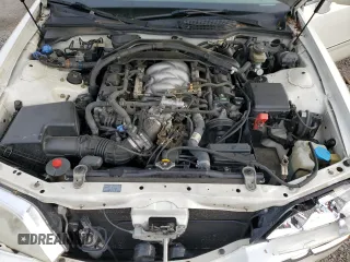 2004 Acura RL w/Navigation System z VIN JH4KA96674C007925, wystawiony jako Copart lot #56732645 z przebiegiem 188 312 mil mil oraz Szkoda całkowita • Salvage title. Historia ofert i sprzedaży dostępna na DreamBid. Obrazek 11.