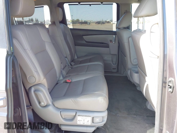 2015 Honda Odyssey Touring Elite с VIN 5FNRL5H93FB056183, выставлен на аукционе IAAI как лот 42073205 с пробегом 119 874 миль миль и . История ставок и продаж доступна на DreamBid. Изображение 8.
