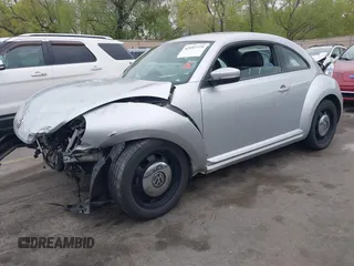 2013 Volkswagen Beetle with VIN 3VWHX7ATXDM658134, listed as a IAAI auction lot 42097779 with 47,901 mi miles and . Bid and sale history available at DreamBid. Image 18.