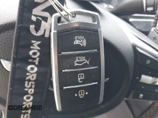 2019 Genesis G70 Dynamic with VIN KMTG34LE9KU027098, listed as a IAAI auction lot 41058372 with 71,732 mi miles and . Bid and sale history available at DreamBid. Image 11.