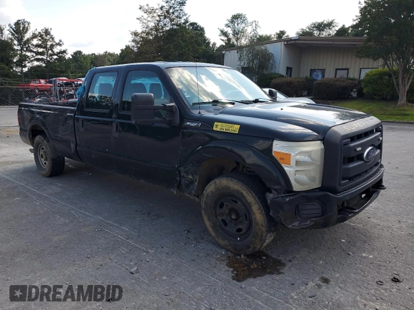 2014 Ford F-250 XL with VIN 1FT7W2A6XEEB36013, listed as a Copart auction lot 62713075 with 245,865 mi miles and Salvage title. Bid and sale history available at DreamBid. Image 4.