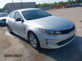 2016 Kia Optima LX z VIN KNAGT4L35G5110359, wystawiony jako IAAI lot #42262630 z przebiegiem 139 055 mil mil oraz . Historia ofert i sprzedaży dostępna na DreamBid. Obrazek 1.