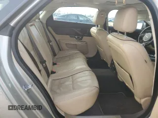2014 Jaguar XJ with VIN SAJWA2GZ8E8V60138, listed as a Copart auction lot 86384064 with 137,190 mi miles and Salvage Title. Bid and sale history available at carsss.com. Image 10.