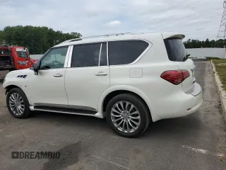 2016 Infiniti QX80 with VIN JN8AZ2NCXG9401865, listed as a Copart auction lot 70574004 with 111,335 mi miles and Salvage Title. Bid and sale history available at DreamBid. Image 2.