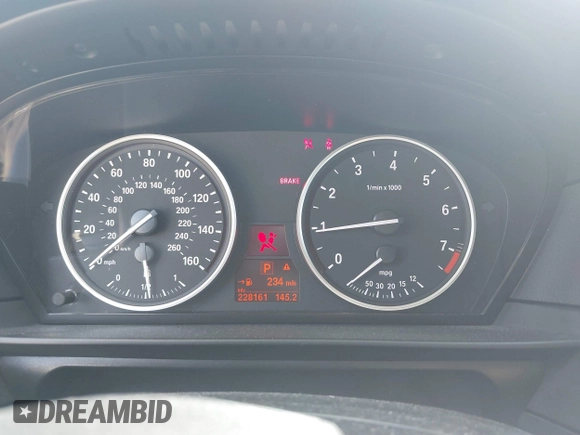 2010 BMW 5 Series 528i with VIN WBANU5C52AC129868, listed as a IAAI auction lot 41765467 with 228,161 mi miles and . Bid and sale history available at carsss.com. Image 7.