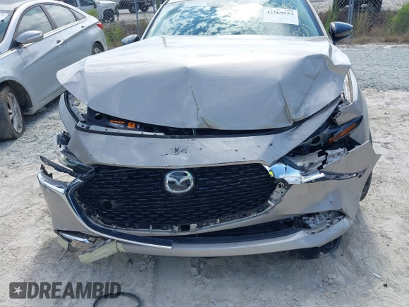 2022 Mazda 3 2.5 Turbo with VIN 3MZBPBAY8NM300598, listed as a IAAI auction lot 42569553 with 27,736 mi miles and . Bid and sale history available at DreamBid. Image 6.