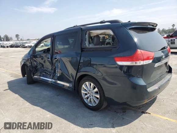 2012 Toyota Sienna XLE AAS with VIN 5TDYK3DC8CS224654, listed as a Copart auction lot 60927385 with 161,282 mi miles and Salvage title. Bid and sale history available at DreamBid. Image 2.