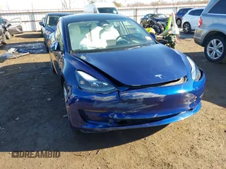 2023 Tesla Model 3 Long Range with VIN 5YJ3E1EB5PF623706, listed as a IAAI auction lot 41321269 with 21,081 mi miles and . Bid and sale history available at DreamBid. Image 6.