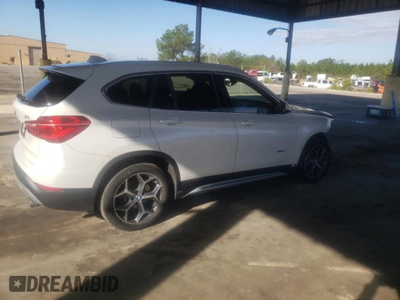 2017 BMW X1 sDrive28i with VIN WBXHU7C31H5H37217, listed as a Copart auction lot 70114342 with 73,683 mi miles. Bid and sale history available at carsss.com. Image 3.