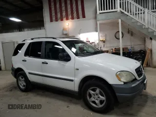 1999 Mercedes-Benz M-Class with VIN 4JGAB54E3XA136026, listed as a Copart auction lot 80469384 with 194,775 mi miles and Salvage Title. Bid and sale history available at carsss.com. Image 4.