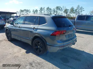 2023 Volkswagen Tiguan SE R-Line Black with VIN 3VVCB7AX7PM132001, listed as a IAAI auction lot 41042085 with 15,007 mi miles. Bid and sale history available at carsss.com. Image 3.