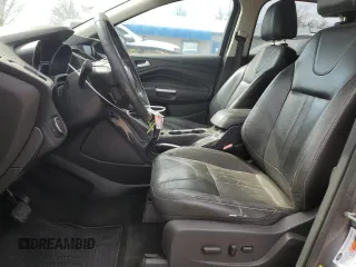2013 Ford Escape Titanium z VIN 1FMCU9J90DUA72264, wystawiony jako Copart lot #49906445 z przebiegiem 126 527 mil mil oraz Szkoda całkowita • Salvage title. Historia ofert i sprzedaży dostępna na DreamBid. Obrazek 7.