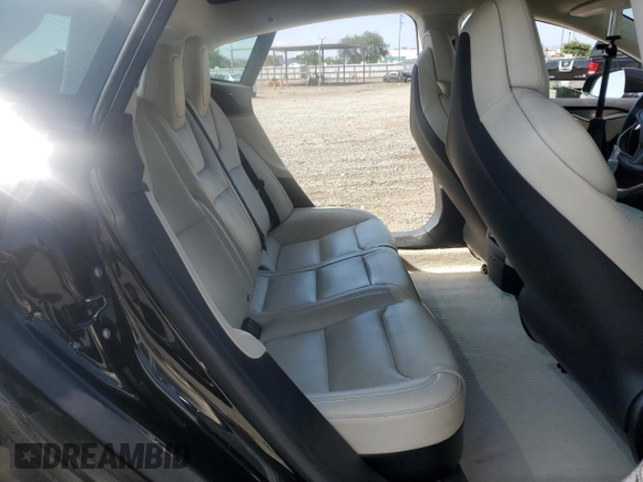 2019 Tesla Model S 100D with VIN 5YJSA1E42KF331240, listed as a Copart auction lot 54713975 with 43,940 mi miles and Salvage title. Bid and sale history available at DreamBid. Image 11.