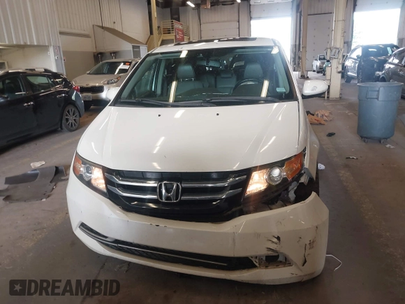 2014 Honda Odyssey EX-L with VIN 5FNRL5H60EB030841, listed as a IAAI auction lot 42271401 with 107,343 mi miles and . Bid and sale history available at DreamBid. Image 13.