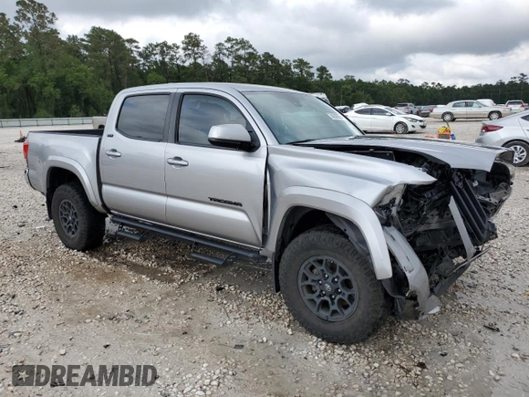 2020 Toyota Tacoma SR5 with VIN 5TFAZ5CNXLX095175, listed as a Copart auction lot 54339355 with 61,187 mi miles and Salvage title. Bid and sale history available at DreamBid. Image 4.