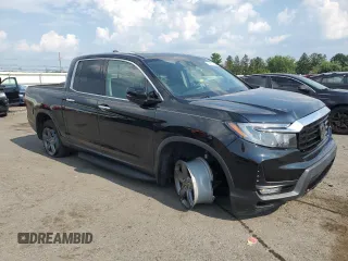 2022 Honda Ridgeline RTL-E with VIN 5FPYK3F7XNB023787, listed as a Copart auction lot 66883515 with 49,786 mi miles and Salvage title. Bid and sale history available at DreamBid. Image 4.