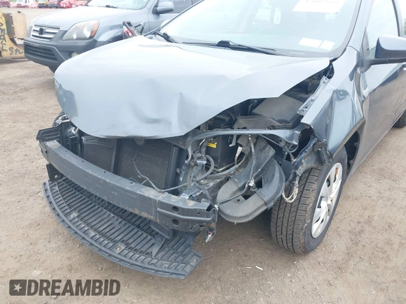 2014 Toyota Corolla L with VIN 2T1BURHE5EC027497, listed as a IAAI auction lot 42602880 with 101,094 mi miles and . Bid and sale history available at DreamBid. Image 6.