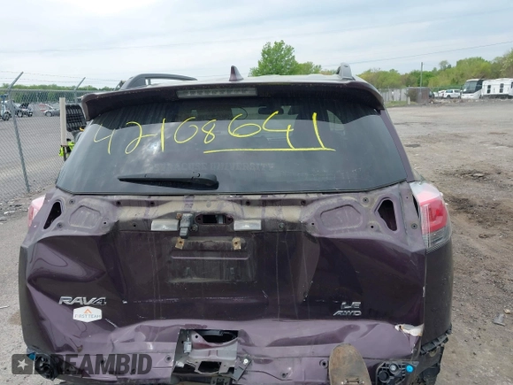 2018 Toyota RAV4 LE with VIN 2T3BFREV9JW771845, listed as a IAAI auction lot 42108641 with 127,394 mi miles. Bid and sale history available at carsss.com. Image 17.