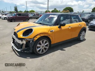2018 MINI Hardtop 4 Door Cooper z VIN WMWXU1C57J2F79879, wystawiony jako Copart lot #65210605 z przebiegiem 63 764 mil mil oraz Szkoda całkowita • Salvage title. Historia ofert i sprzedaży dostępna na DreamBid. Obrazek 1.