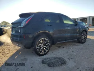 2024 Cadillac XT4 FWD Sport with VIN 1GYFZER47RF101186, listed as a Copart auction lot 79128454 with 10,499 mi miles and Salvage title. Bid and sale history available at DreamBid. Image 3.