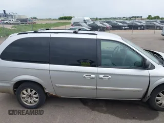 2006 Chrysler Town & Country Touring z VIN 2A4GP54L96R730719, wystawiony jako IAAI lot #42363419 z przebiegiem 186 173 mil mil oraz . Historia ofert i sprzedaży dostępna na DreamBid. Obrazek 13.