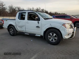 2015 Nissan Frontier S with VIN 1N6AD0EV7FN728470, listed as a Copart auction lot 81985474 with 62,004 mi miles and Salvage title. Bid and sale history available at DreamBid. Image 4.