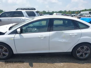 2018 Ford Focus SE z VIN 1FADP3FE5JL267982, wystawiony jako IAAI lot #42646881 z przebiegiem 40 163 mil mil oraz . Historia ofert i sprzedaży dostępna na DreamBid. Obrazek 14.