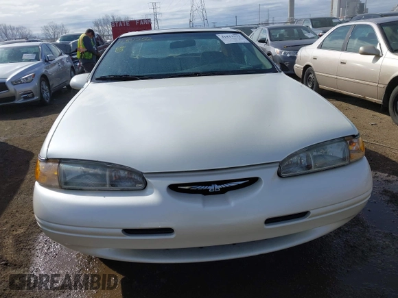 1996 Ford Thunderbird LX z VIN 1FALP6240TH131517, wystawiony jako IAAI lot #41811552 z przebiegiem 87 493 mil mil oraz . Historia ofert i sprzedaży dostępna na DreamBid. Obrazek 12.